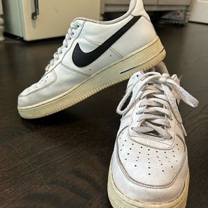 Nike air force 1’s with black swoosh